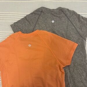 TWO LULULEMON Swiftly Tech Short-Sleeve Shirts Hip Length